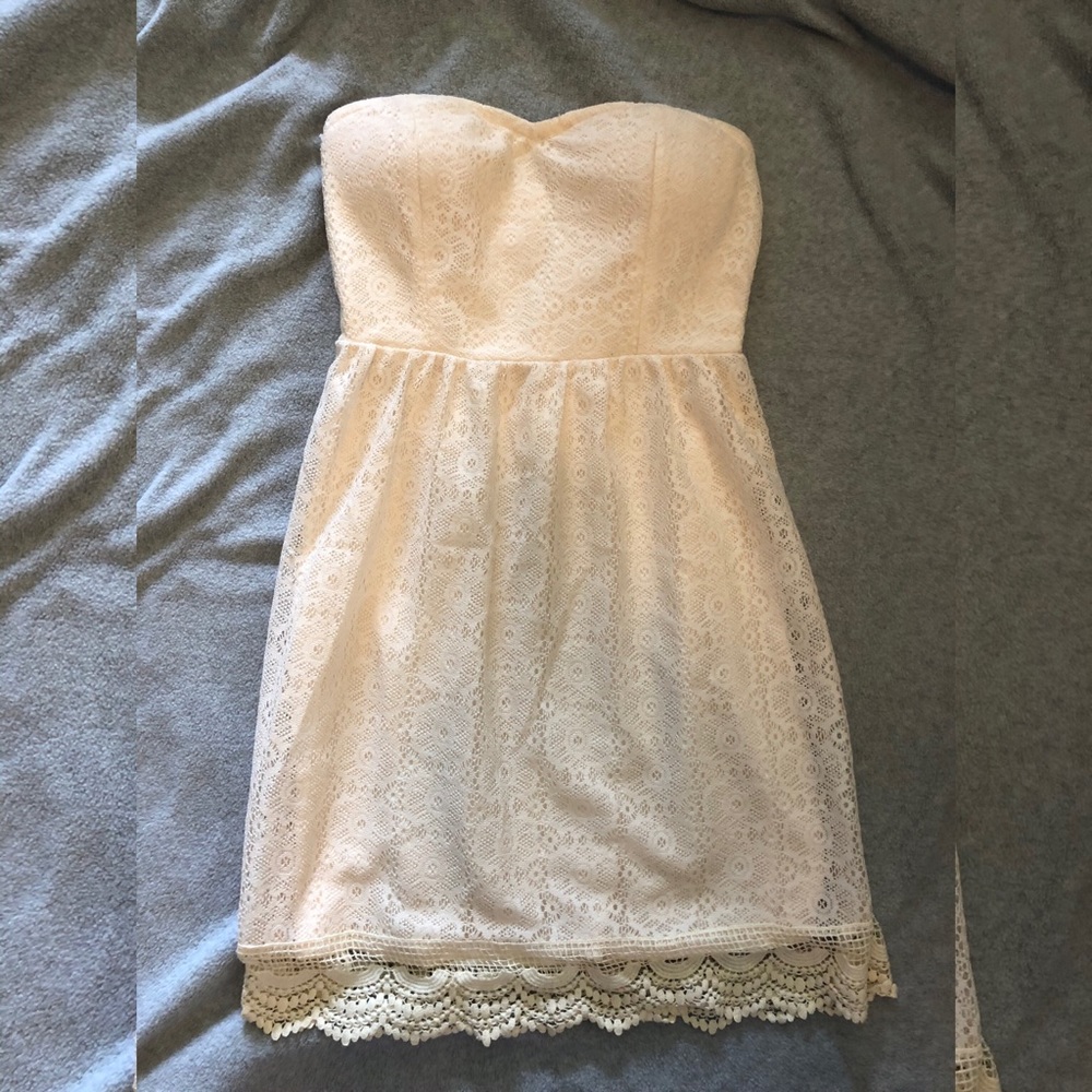 Strapless cream lace dress.